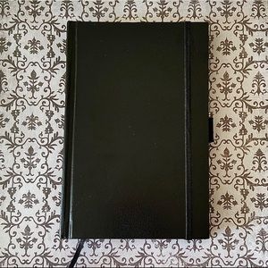 Black leather journal or sketchbook